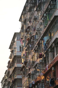 Low angle view of buildings against clear sky