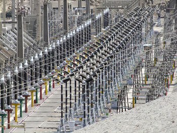 High angle view of metal structure amidst buildings in city
