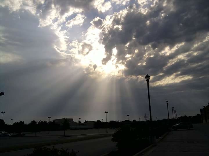 sky, cloud - sky, sun, sunbeam, sunset, silhouette, cloudy, sunlight, cloud, lens flare, street light, beauty in nature, nature, weather, scenics, tranquility, tranquil scene, road, back lit, outdoors