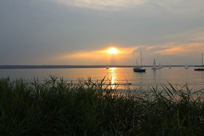 Scenic view of sea against sky during sunset