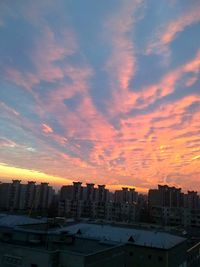 View of cityscape at sunset