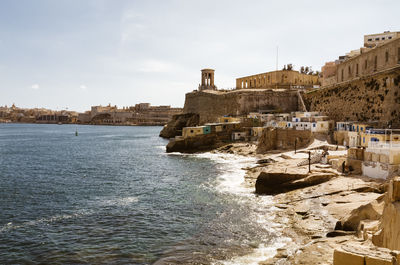 View of the historic cityscape and coastline, at the mediterranean sea.