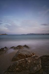 Scenic view of sea against sky during sunset