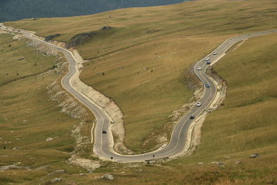 High angle view of winding road on landscape