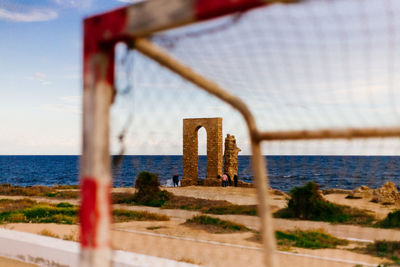 Metallic structure on beach