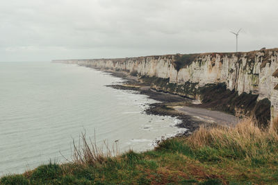 Scenic view of sea against sky. scenic view of cliff against sky. cliff of normandy 