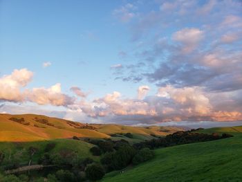 Scenic view of landscape against sky during sunset