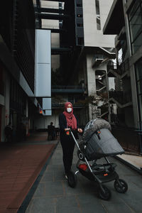 Mom with stroller baby