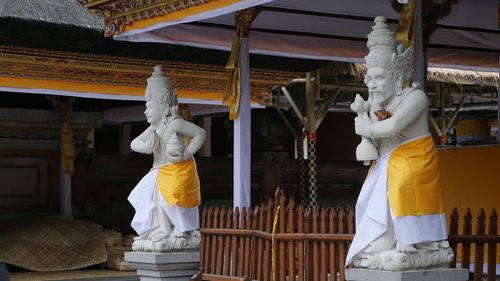 Statue of buddha outside building