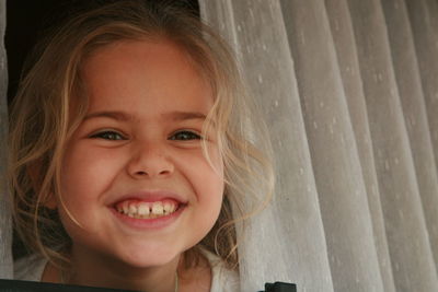 Close-up portrait of a smiling girl