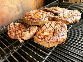 Close-up of meat on barbecue grill