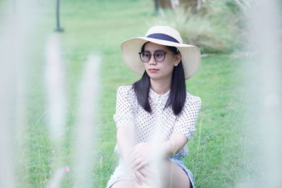 Portrait of beautiful woman wearing hat