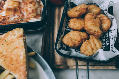 High angle view of serving food on table