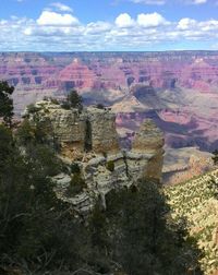 Scenic view of rock formations against sky