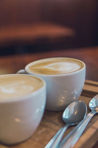 Close-up of cappuccino on table