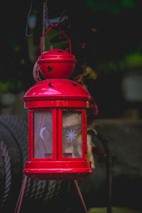 Close-up of red lantern at dusk