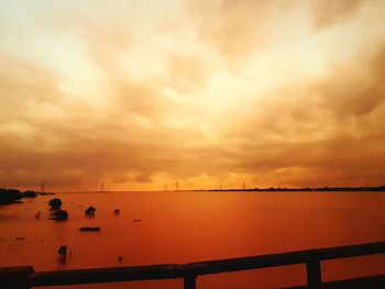 Scenic view of sunset over calm sea