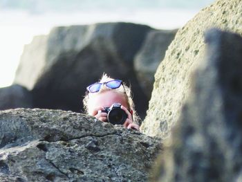 Portrait of man on rock