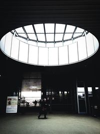View of people walking on tiled floor