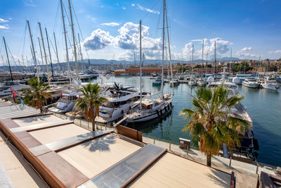 Boats moored at harbor