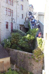 People in front of historical building