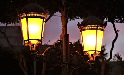 Illuminated street light at night