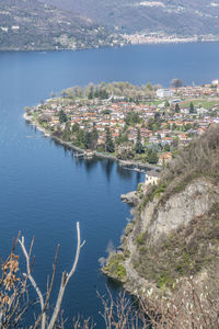 High angle view of buildings by sea