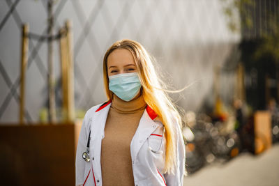 Portrait of woman wearing mask