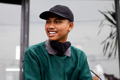 Portrait of young man looking away