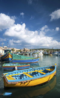 Boats moored in harbor
