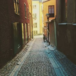 Narrow alley along buildings