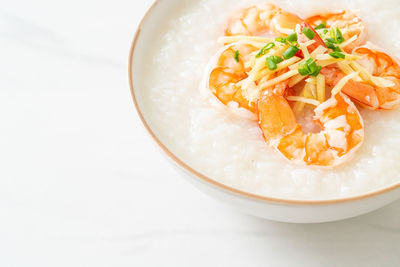 Close-up of food in bowl on white background