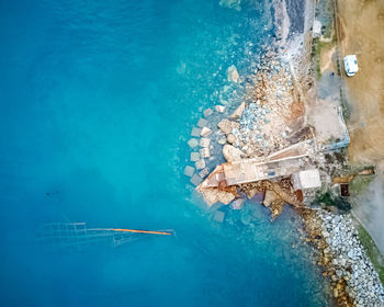 High angle view of swimming pool by sea