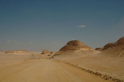 Scenic view of desert against sky