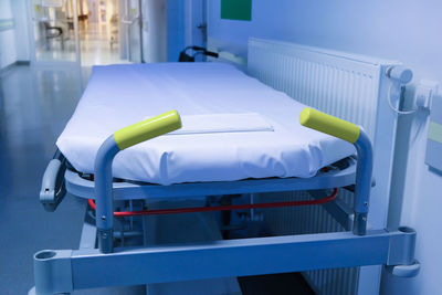 A bed for patients in the hospital corridor. close up