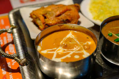 High angle view of curry in plate on table