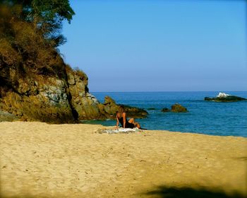 Scenic view of sea against clear sky