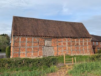 Low angle view of old building against sky