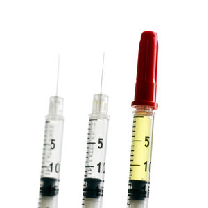 Close-up of pipes against white background