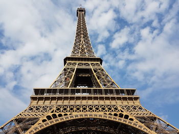 Close-up low angle view of eiffel tower