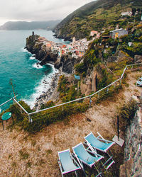 High angle view of townscape by sea