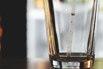 Close-up of glass on table