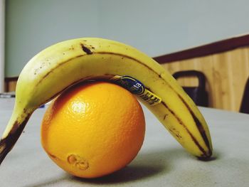 Close-up of yellow lemon on table