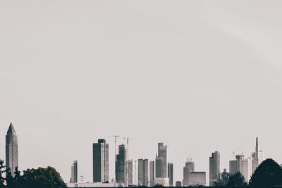 Modern buildings against clear sky