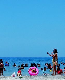 People enjoying at beach