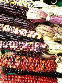 Stack of vegetables for sale in market