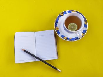 High angle view of coffee cup on table