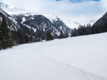 Snow covered mountain against sky