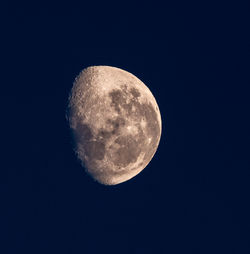 Low angle view of moon against clear sky at night