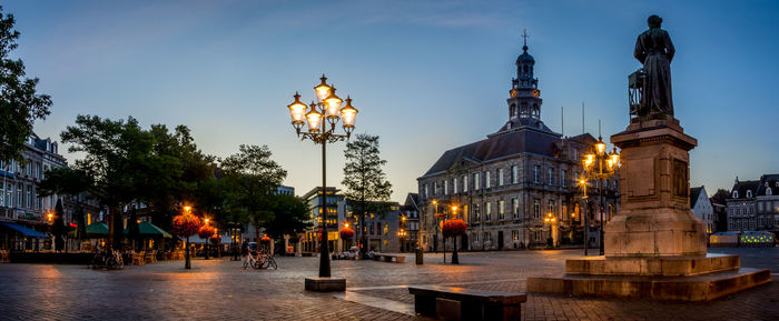 Lamp posts against built structures